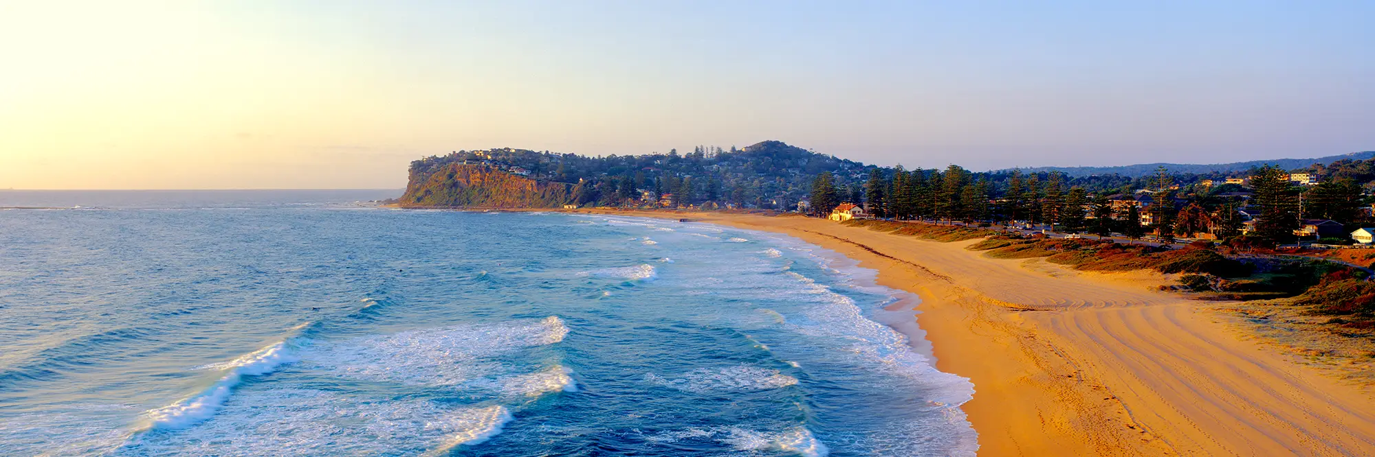 Newport Beach, Northern Beaches, Sydney, looking north along the sand at golden hour